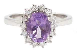 18ct white gold oval amethyst and round brilliant cut diamond cluster ring