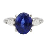 Platinum three stone oval cut sapphire and pear cut diamond ring