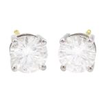 Pair of 18ct white and yellow gold round brilliant cut diamond stud earrings