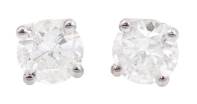 Pair of 18ct white gold round brilliant cut diamond stud earrings