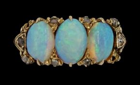 Early 20th century 15ct gold three stone opal ring