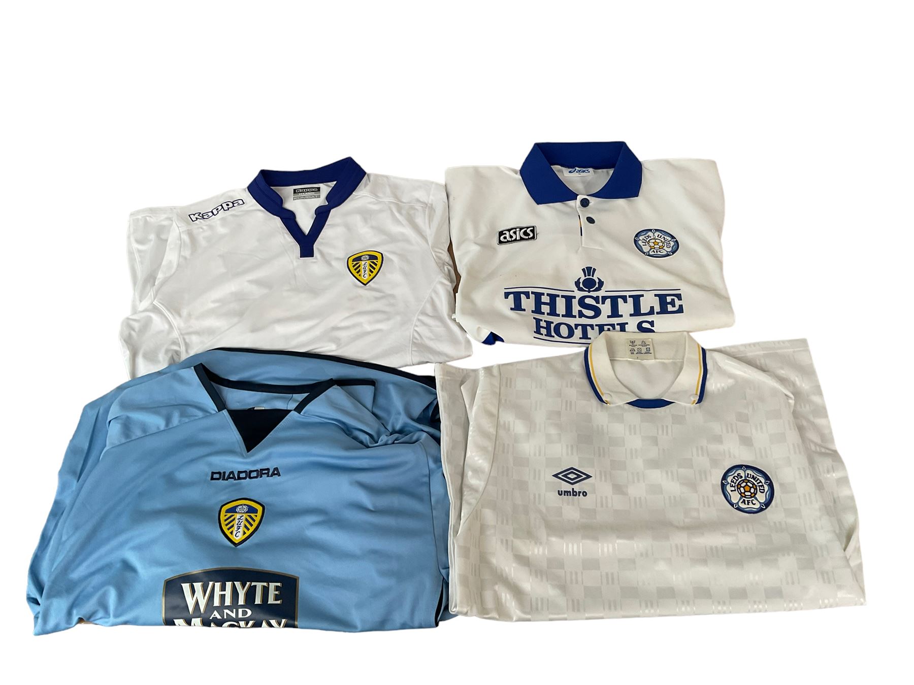 Leeds United football club - twenty-four replica shirts including home and away - Image 4 of 7