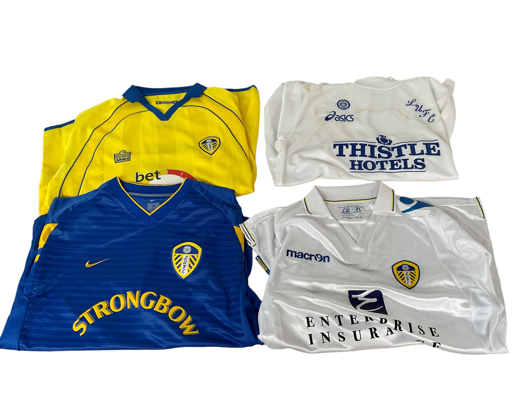 Leeds United football club - twenty-four replica shirts including home and away - Image 6 of 7