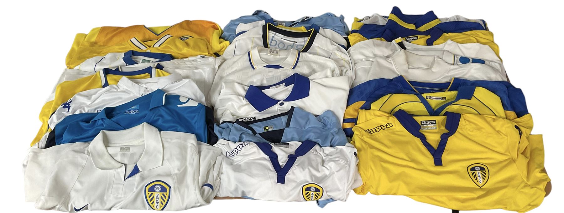 Leeds United football club - twenty-four replica shirts including home and away