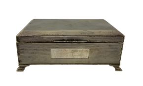 Engine turned silver cigarette box with bracket feet 17cm x 10cm Birmingham 1946 Maker Bert Gordon