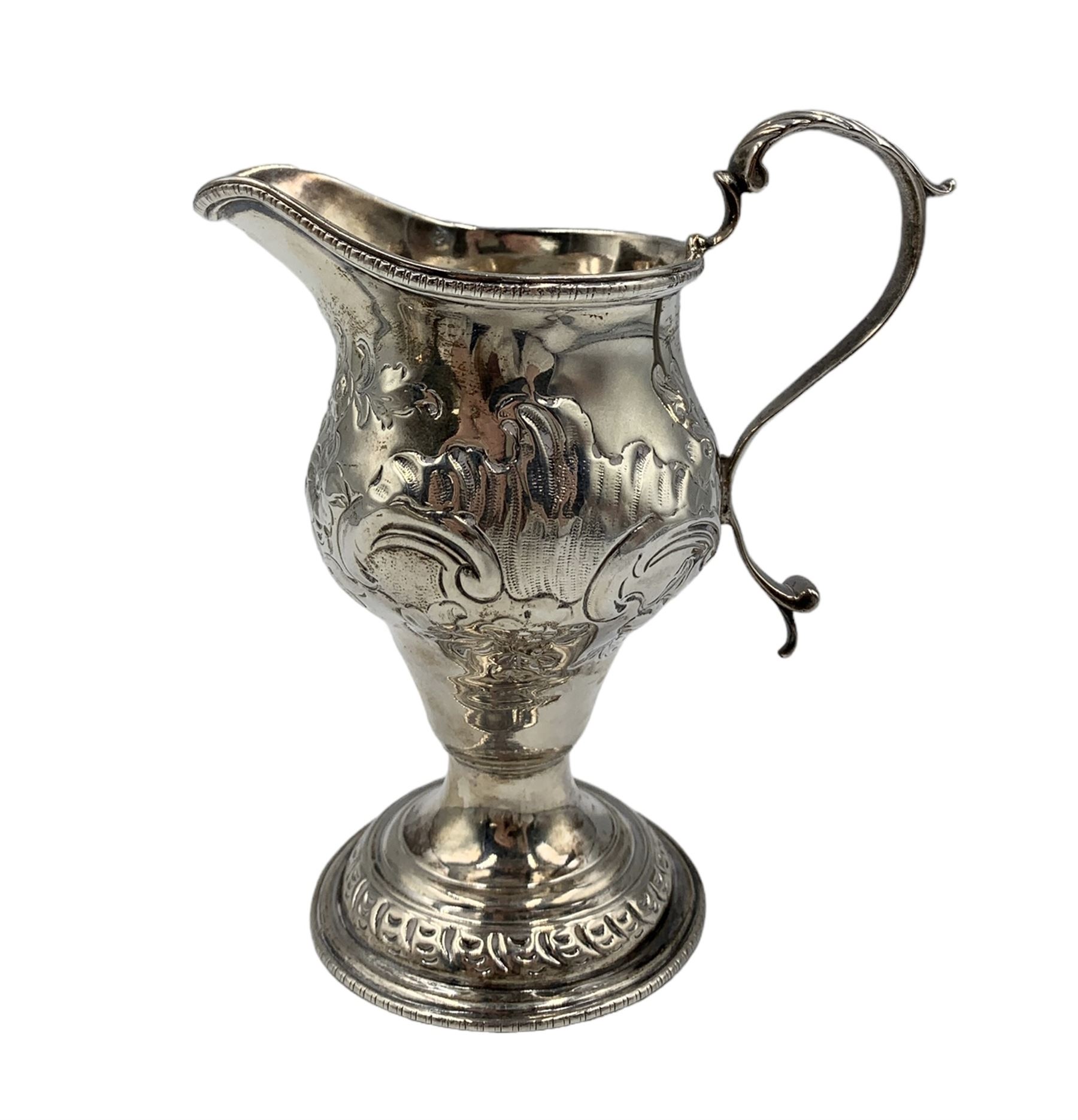 George III silver baluster cream jug with scroll handle and later embossed decoration - Image 3 of 4
