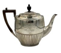 Late Victorian silver oval teapot with ebonised handle and lift
