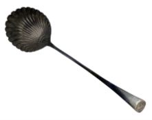 Georgian silver soup ladle with shell terminal and fluted bowl