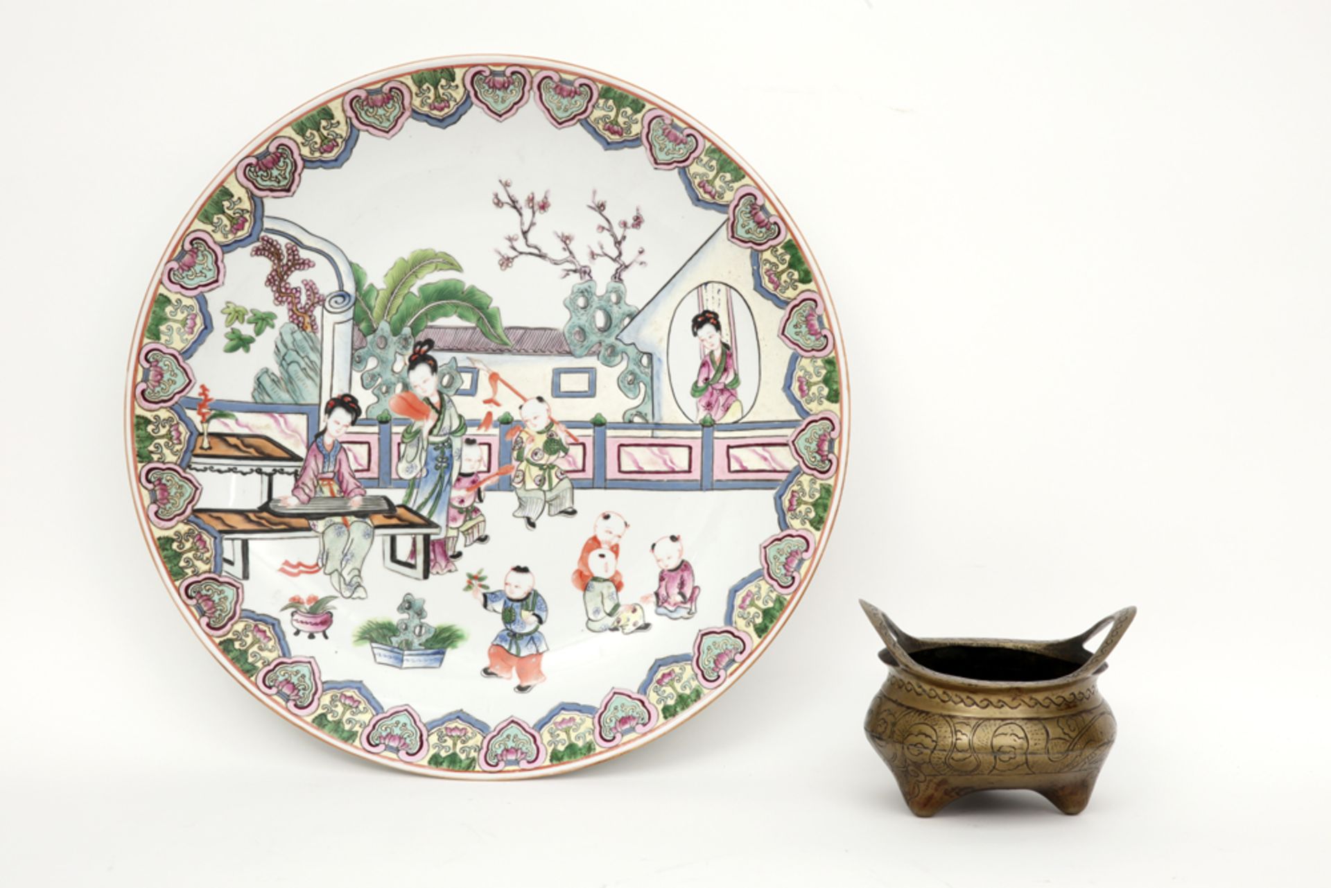 quite big round Chinese dish in marked porcelain with a polychrome decor and a marked Chinese bronze