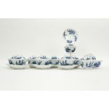 series of eight Chinese sets of cup, saucer and lid in marked porcelain with blue-white decor (+ two