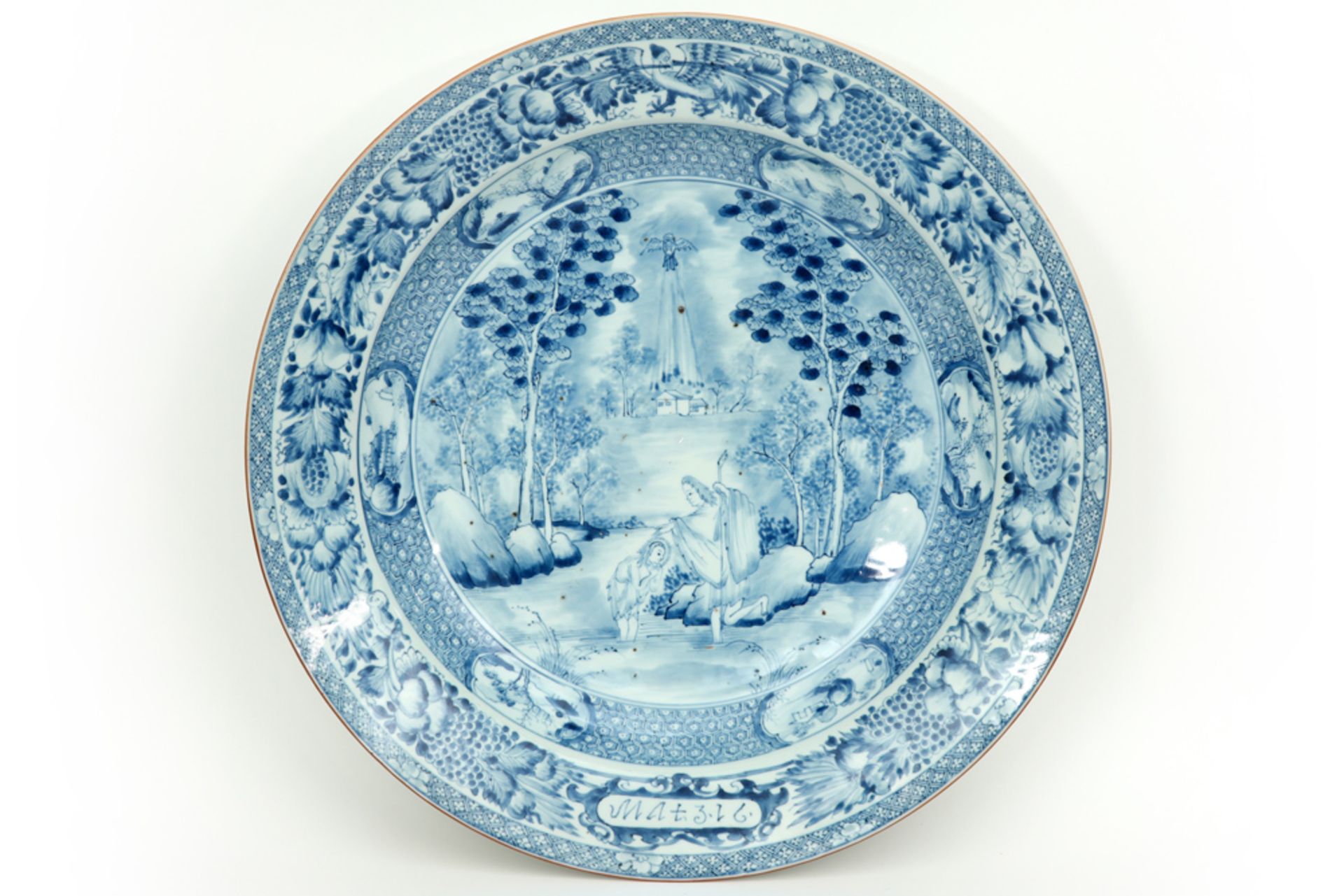 large early 18th Cent. Chinese "Jesuit" dish in porcelain with a blue-white decor with the