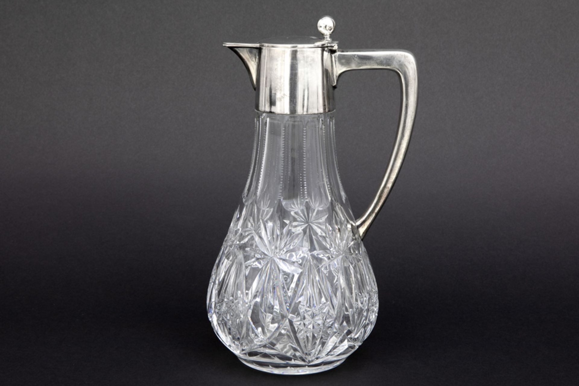 German decanter/claret jug in crystal with a mounting in "835" marked silver || Karaf in kleurloos