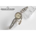 vintage Jaeger-LeCoultre marked mechanical ladies' wristwatch in white gold (18 carat) with diamonds