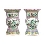 pair of 18th Cent. Chinese spittoon vases in porcelain with a 'Famille Rose' decor with pheasants in