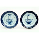 pair of 18th Cent. Chinese plates in porcelain with a quite special blue-white jardinier decor ||