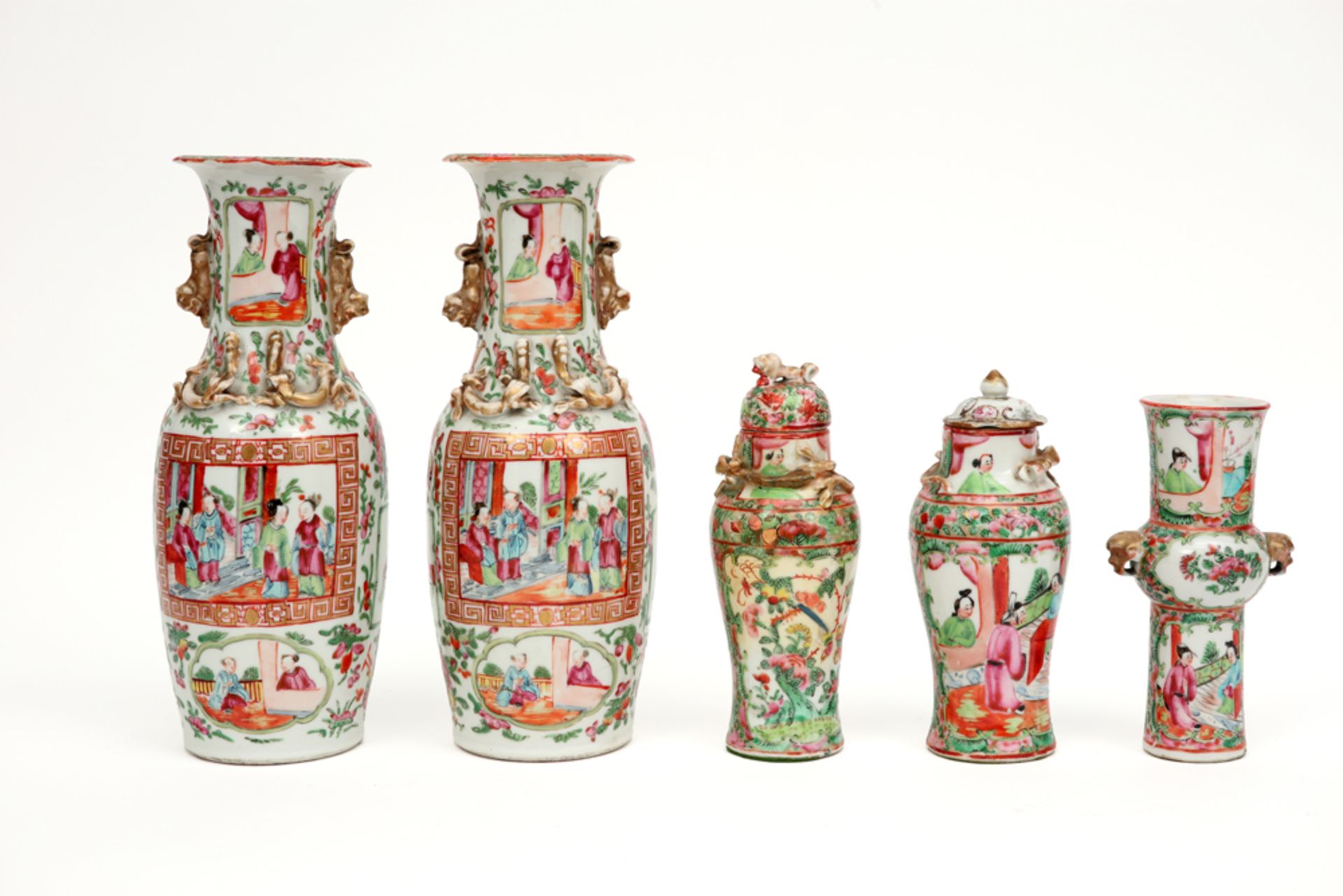 five pieces of antique Chinese porcelain with Cantonese decor amongst which a pair of vases ||