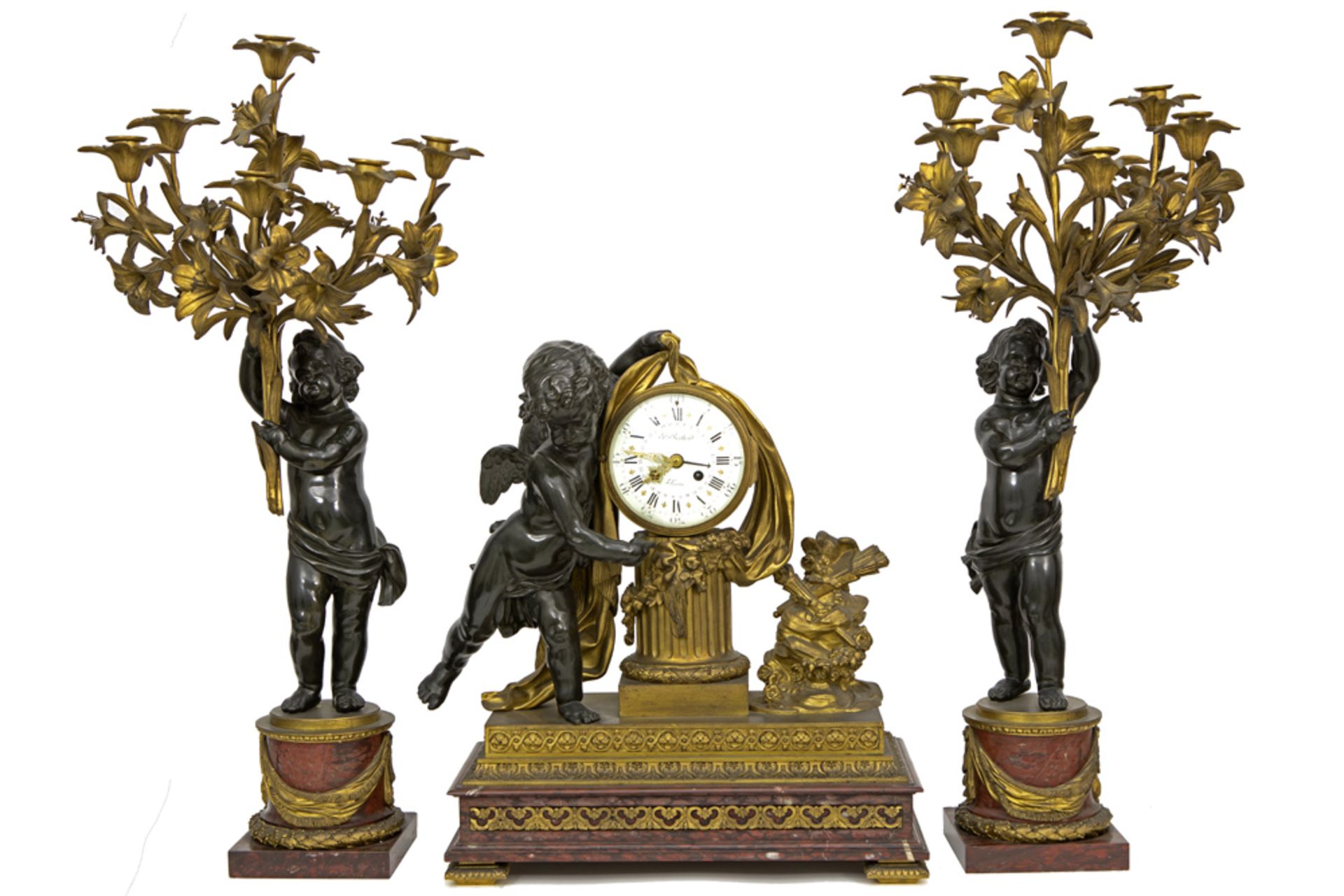 quite impressive 19th Cent. French garniture in red marble and partially guilded bronze : a pair