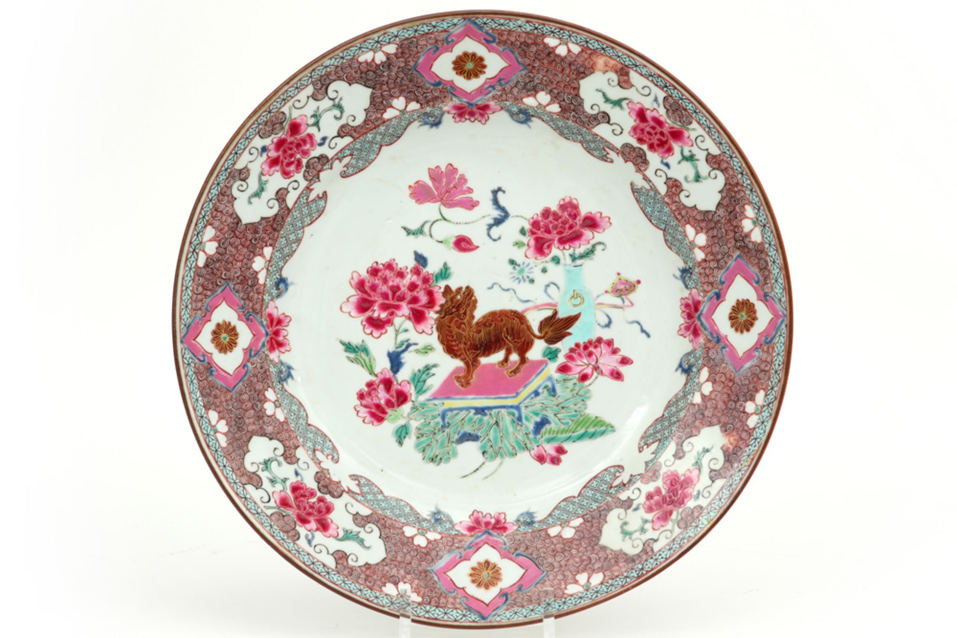 18th Cent. Chinese dish in porcelain with a 'Famille Rose' decor with in the center a cute temple