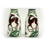 pair of Keramis marked Art Deco vases in ceramic with a polychrome decor with deer || Paar Art