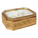 antique jewelry-box in gilded bronze with its lid adorned with a miniature with a mythological scene