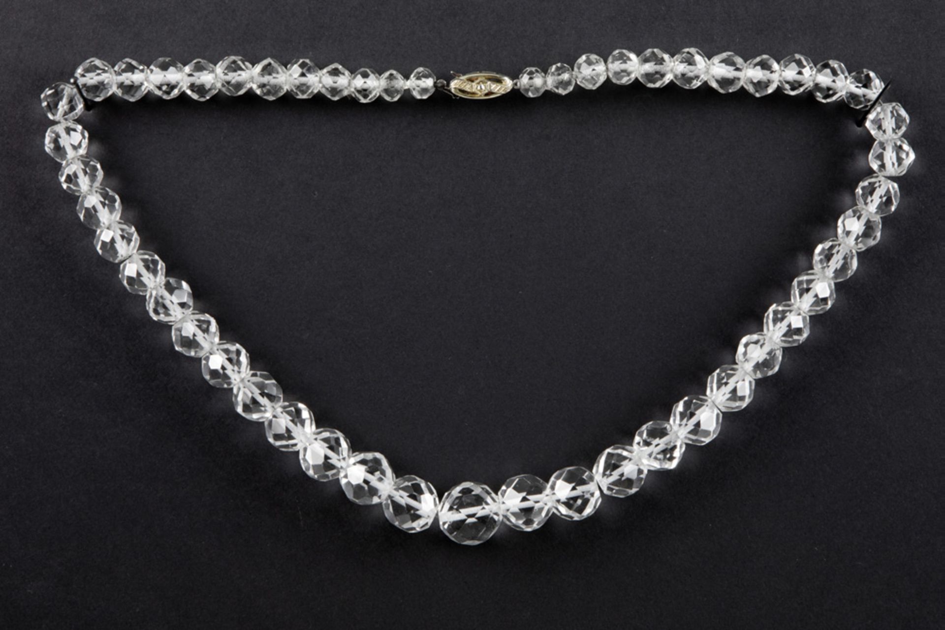 necklace with faceted rock crystal beads and with a lock in white gold (18 carat) with diamond ||