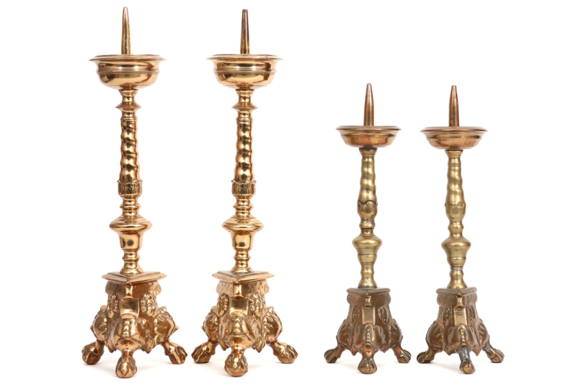 two pairs of brass 17th Cent. Flemish candlesticks with certificate and buyer's note of antique