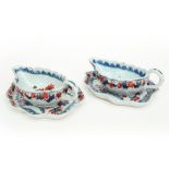 pair of 18th Cent. Chinese sauce boats with their saucers in porcelain with an Imari decor || Paar