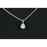 a ca 0,70 carat quality drop cut diamond set in white gold (18 carat) - with a chain in white