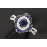 ring in white gold (18 carat) with ca 1,40 carat of sapphire and ca 0,40 carat of high quality
