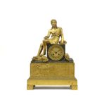 early 19th Cent. French clock in partially gilded bronze with a "Young man with dog" sculpture and a
