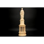 19th Cent. European ivory "lady Justice" sculpture on an ivory base with circular temple shape