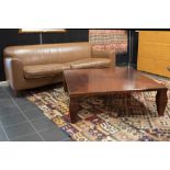Italian Giorgetti marked set of a leather sofa and a coffeetable with a design by Leon Krier||