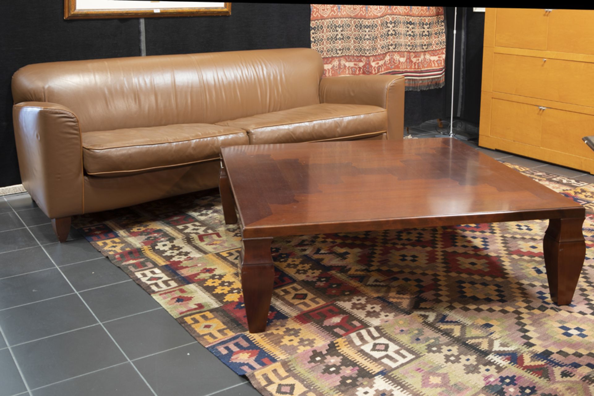 Italian Giorgetti marked set of a leather sofa and a coffeetable with a design by Leon Krier||