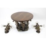 set of a pair of bronze wall lights and an occasional table with bronze base, each with dragons||Set