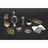 nine smalls with 6 pieces of silver, an antique purse, an pendant with "One Dollar" coin and a flask