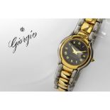 completely original "Giorgio Beverly Hills" marked quartz ladies' wristwatch in steel and gold -with