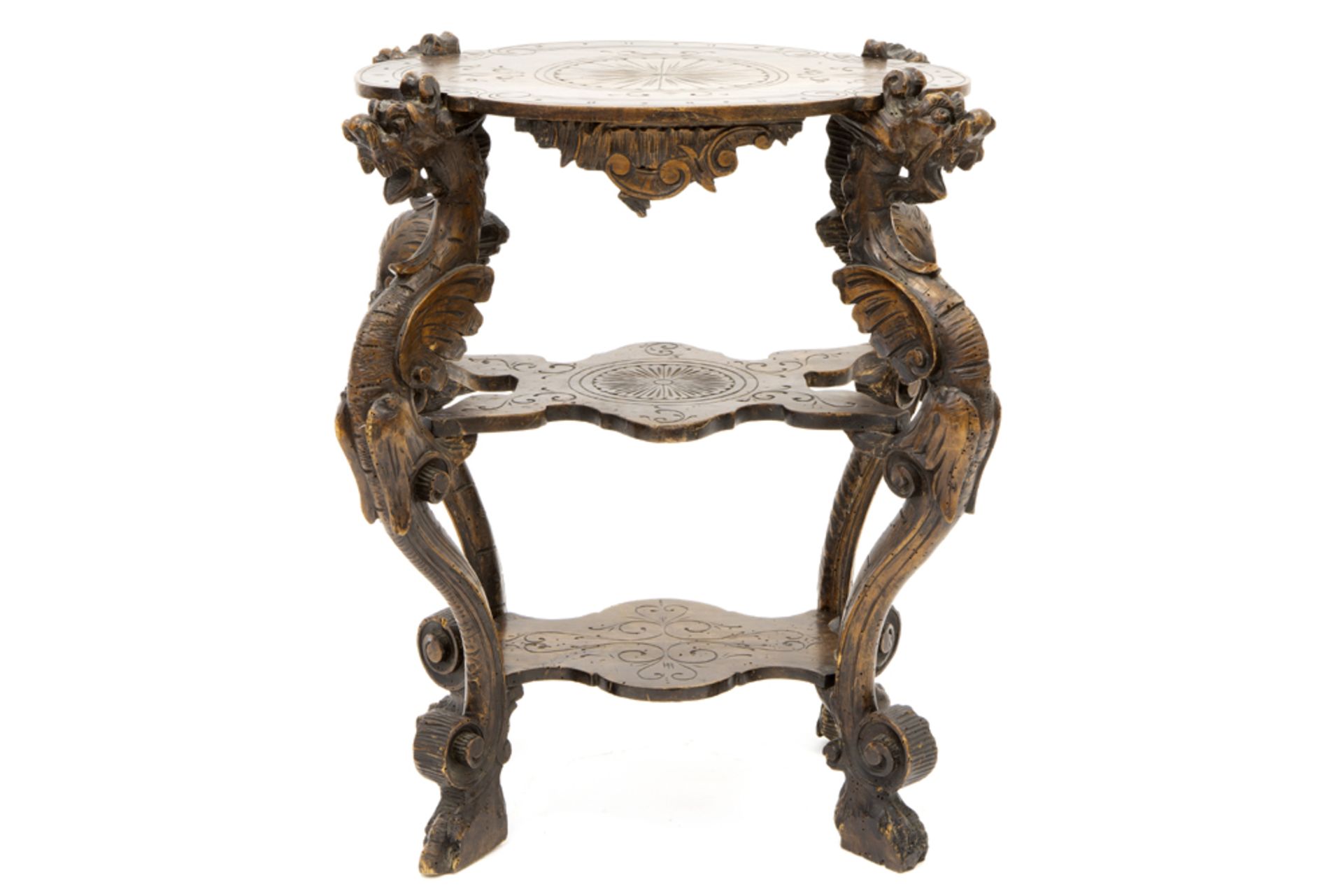 small antique occasional table in walnut with four sculpted dragon shaped legs||Antieke