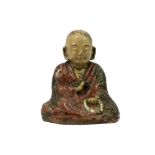 antique oriental "Buddha" sculpture in glazed earthenware with an inscription on its back||Antieke