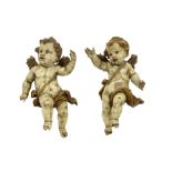pair of small antique "Cupid" sculptures in polychromed wood||Paar kleine antieke sculpturen in