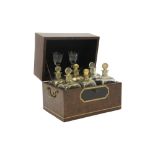 antique licquor cellar with case in burr of walnut with inlay and with original content with two