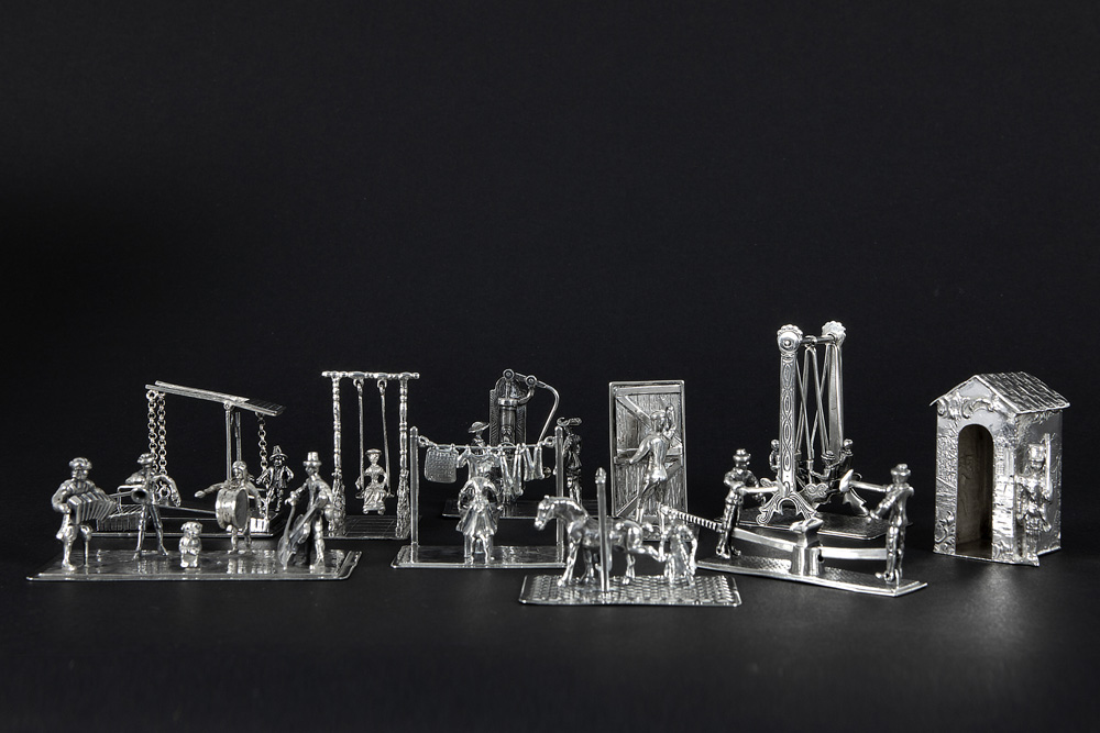 collection of ten quite big miniatures in marked silver||Lot van tien vrij grote miniaturen in
