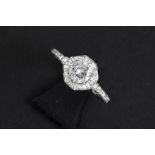 a 0,72 carat high quality brilliant cut diamond set in a ring in white gold (18 carat) with ca 0,