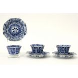 series of three antique Chinese sets of cup and saucer in marked porcelain with a blue-white flowers