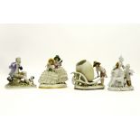 four figures in porcelain, amongst which an Art Deco one marked Capo di Monte||Lot van vier bibelots