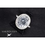 Mauboussin marked ring in white gold (18 carat) with a topaz surrounded by brilliant cut