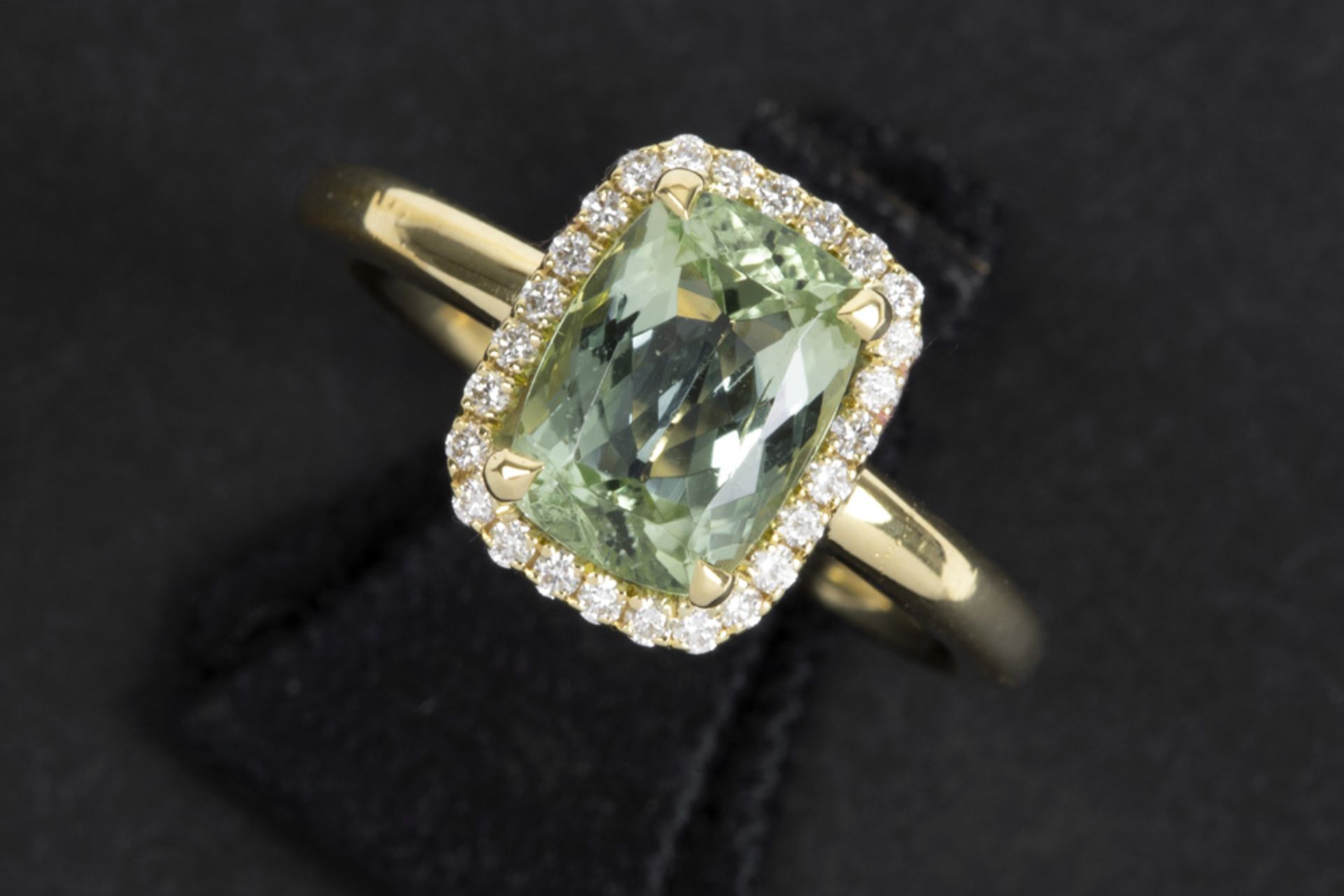 ring in yellow gold (18 carat) with a 2,35 carat natural cushion cut Tourmaline surrounded by 0,16