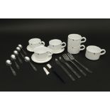 several Sabena memorabilia amongst which cutlery and cups with a decor based on René Magritte ||