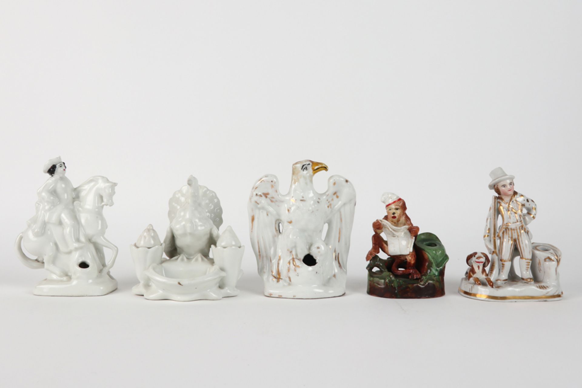 five antique inkstands in porcelain, each depicting an animal