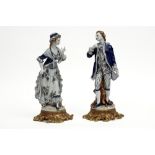 pair of Italian figures on a gilde base in Tosca marked porcelain