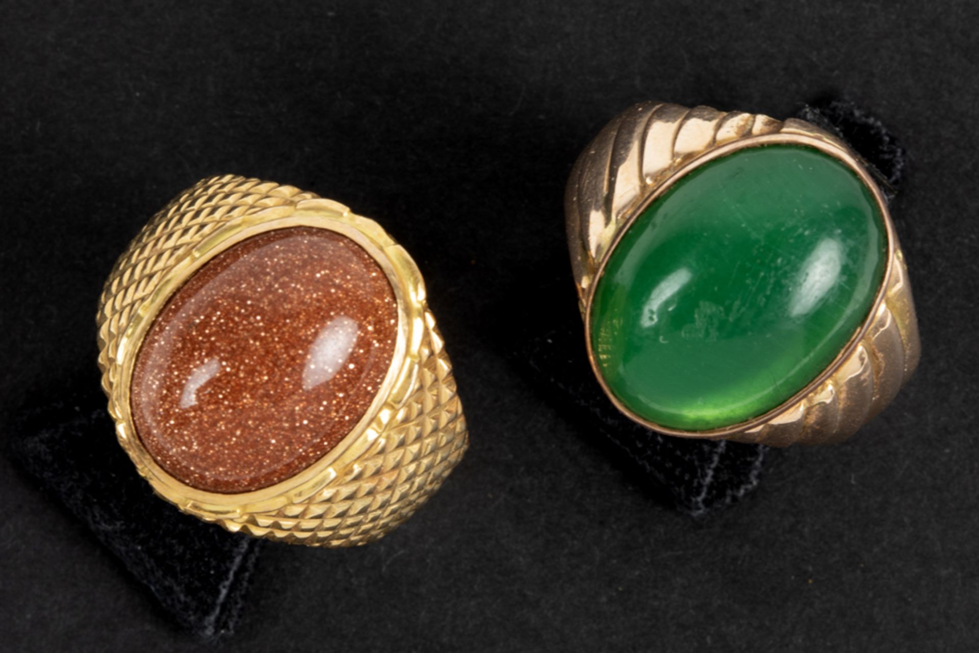 two ring in yellow gold (18 carat) each with a cabochon (chrysofaze and tiger eye)